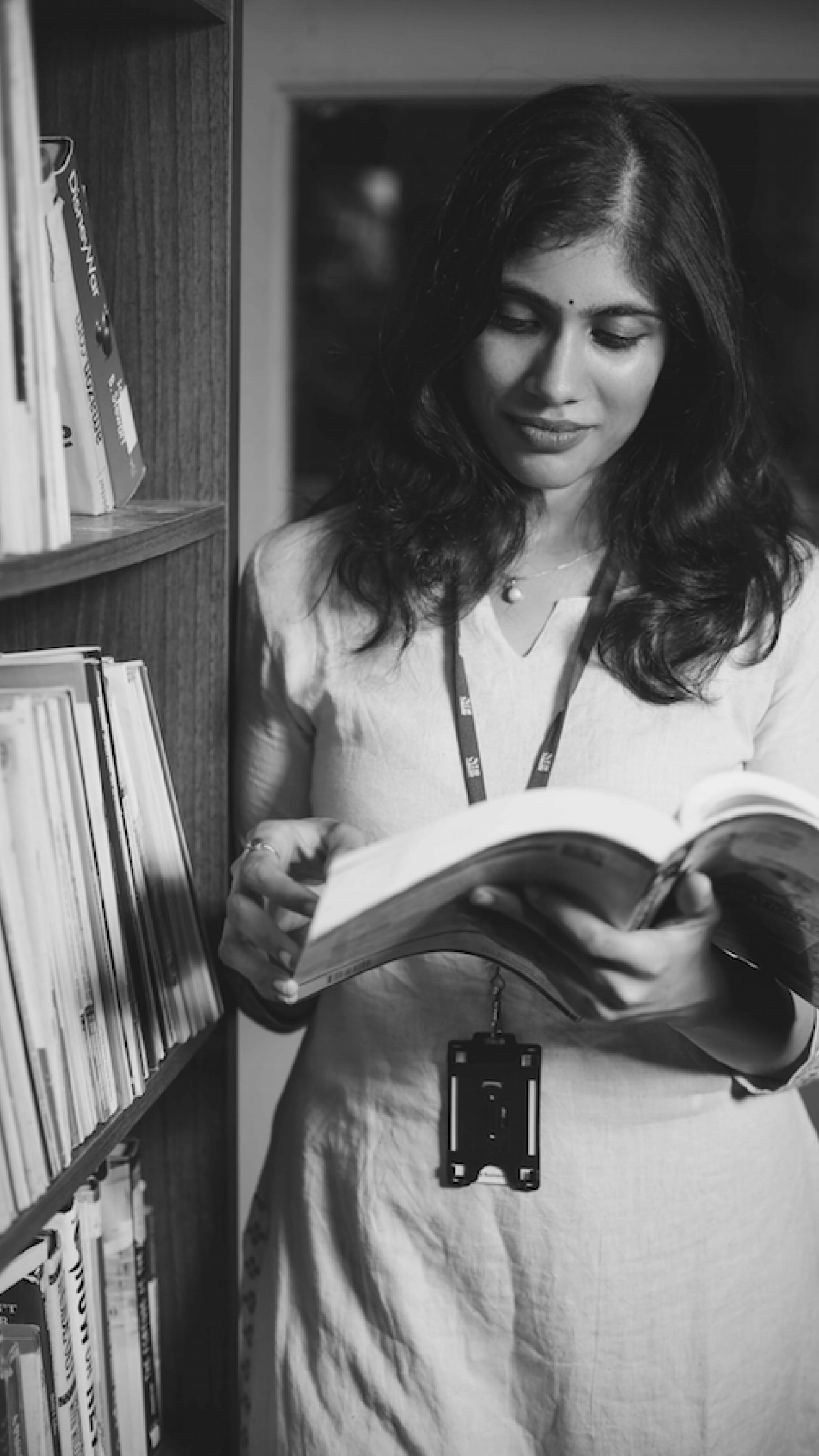 Young girl studying in Library- MBA courses in marketing